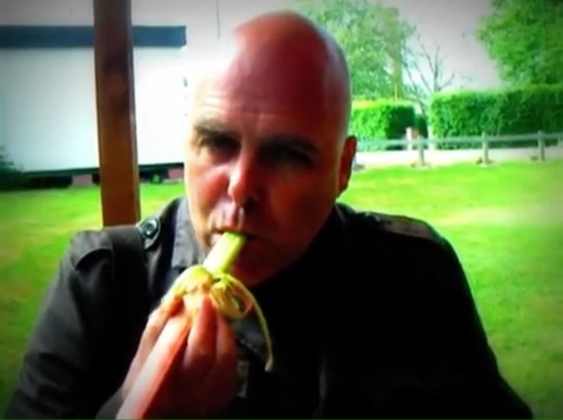 Paul Conneally (Little Onion) writer and artist eating Rhubarb 